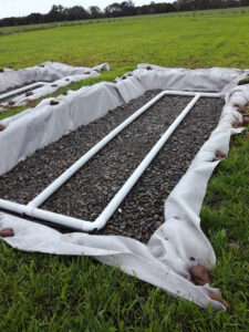 Soak bed installation for wastewater drainage at a property