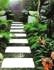 Concrete pavers installed in a neat pattern in a garden